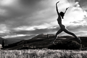woman joyfully leaping