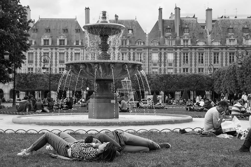christine spring photography - people laying by a fountain